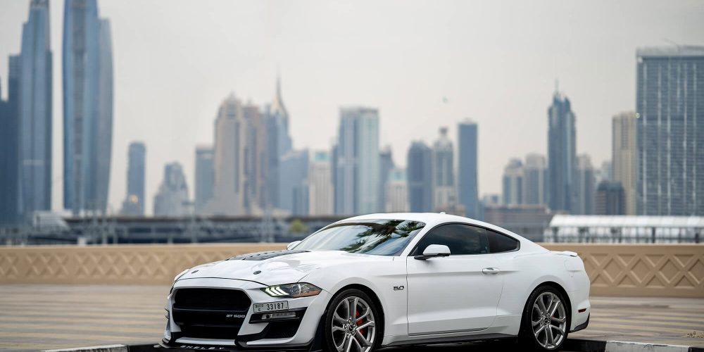 Stylish white Ford Mustang GT for rent in Dubai offering powerful performance sleek design and modern features for an exhilarating driving experience