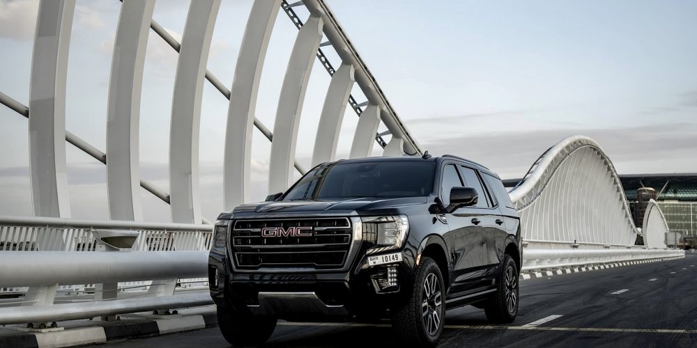 Luxurious black GMC Yukon for rent in Dubai offering spacious comfort advanced technology and powerful performance for an exceptional driving experience