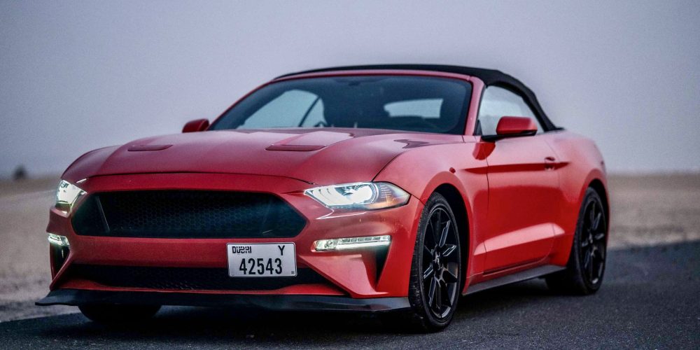 Iconic red Ford Mustang 2022 for rent in Dubai offering a perfect blend of powerful performance sleek design and modern features for an exhilarating driving experience