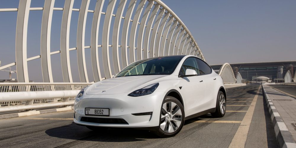 Sleek white Tesla Model Y Long Range 2022 for rent in Dubai offering advanced electric performance modern design and premium comfort