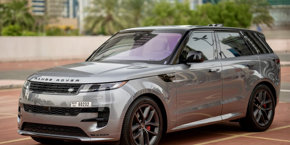 Stylish grey Range Rover Sport 2023 for rent in Dubai offering luxurious comfort advanced technology and powerful performance for an exceptional driving experience